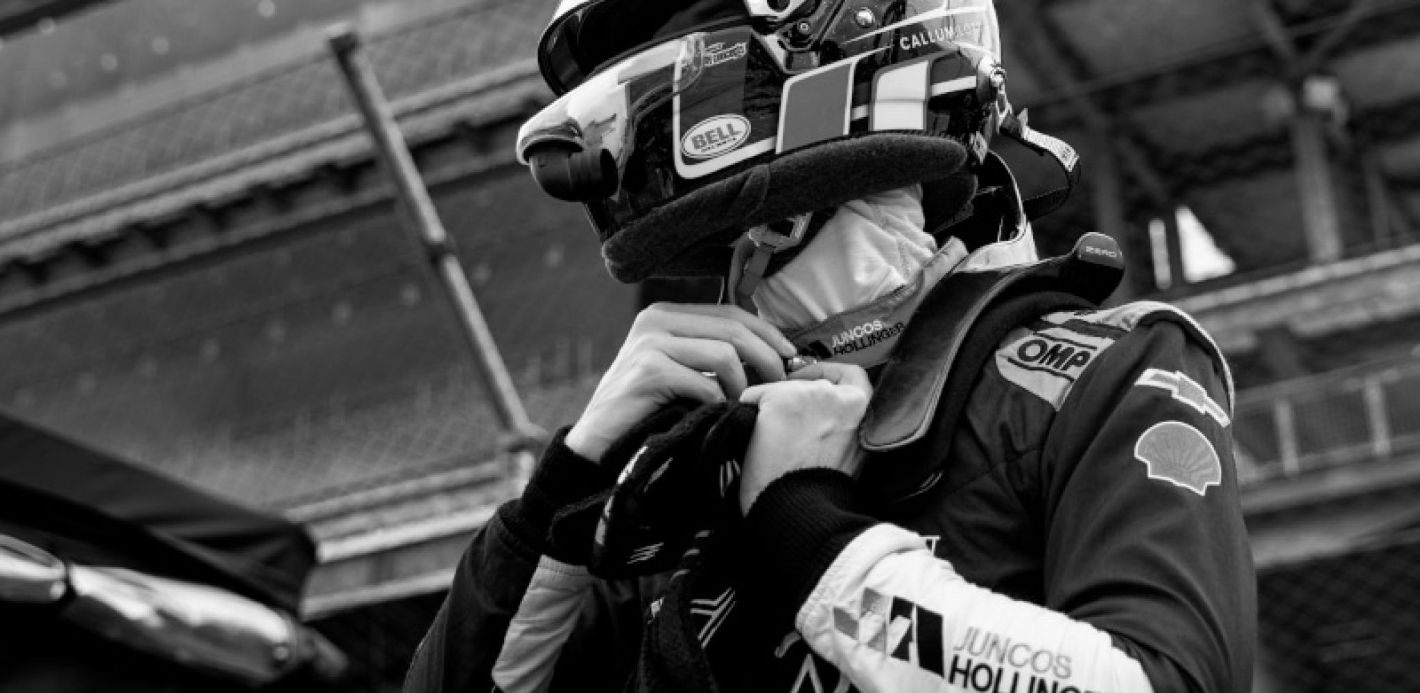 CALLUM ILOTT (77) of Cambridge, Cambridgeshire, England suits up on pit road prior to a practice for the GMR Grand Prix at Indianapolis Motor Speedway in Speedway IN.